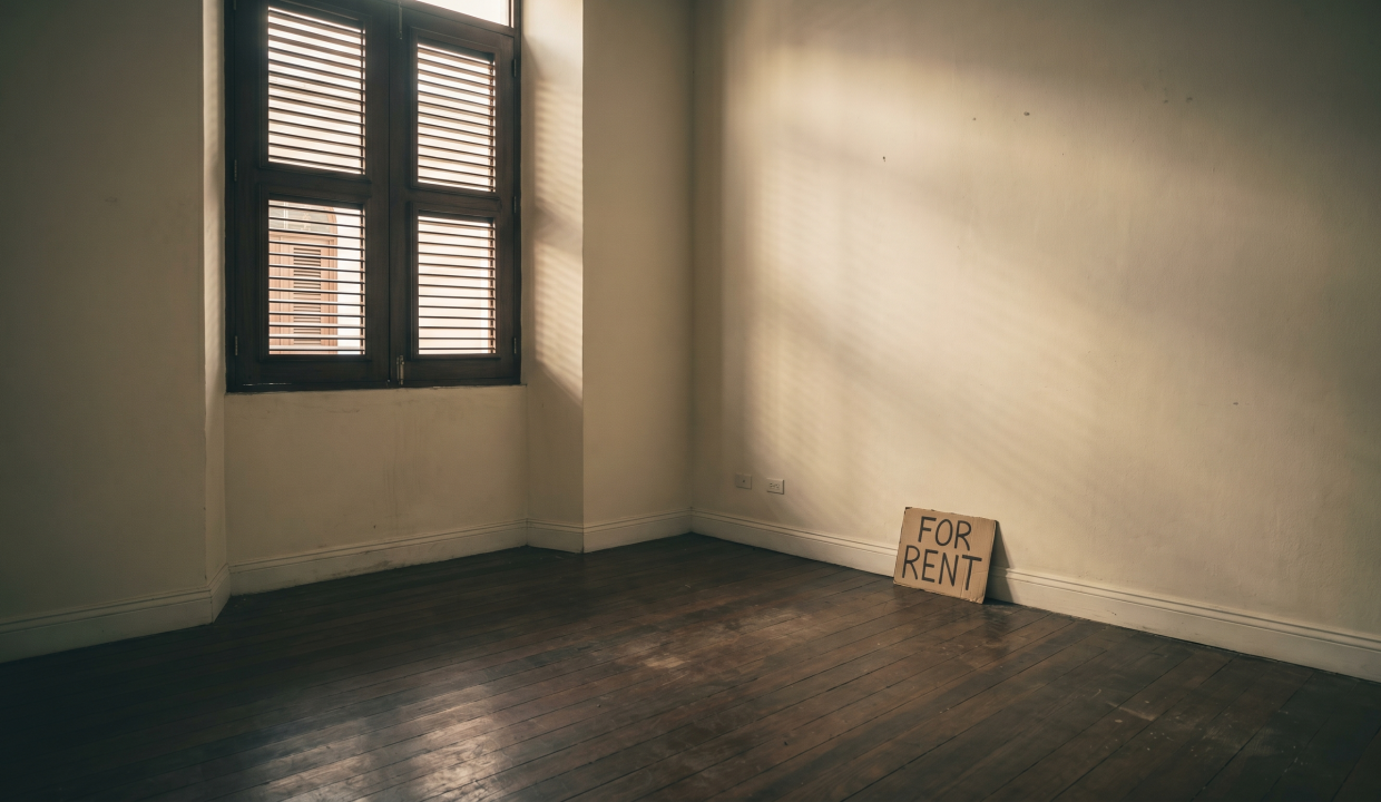 Empty rental apartment with For Rent sign and afternoon sunlight — FRBO landlord vacancy cost Puerto Rico